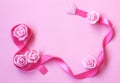 Gentle background with pink silk ribbon, rose flowers, Internati