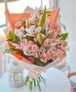 Gentle bouquet of orchids and lilies Royalty Free Stock Photo