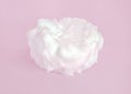 Gentle cosmetic white cream on pastel pink background