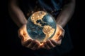 Gentle female hands hold a glowing globe, symbolizing maternal care for the planet and hope