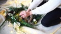 Gentle hands of woman decorate New Year`s decorations for celebr Royalty Free Stock Photo