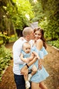 Parents with their baby girl walking outdoors Royalty Free Stock Photo