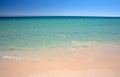 Gentle lapping waves on Tarifa beach in southern Spain Royalty Free Stock Photo