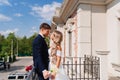 gentle and loving bride and groom in traditional wedding clothes on the terrace. Royalty Free Stock Photo