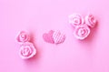 Gentle pink holiday background with two hearts, rose flowers Royalty Free Stock Photo