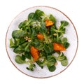 Gentle salad Korn with pine nuts and tangerine