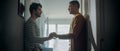 Gentle Scenes of a Stylish Young Adult Gay Couple Spend Time at Home. Two Happy Men in Love Stand in Royalty Free Stock Photo