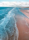 Gentle sea waves on the beach and clear water Royalty Free Stock Photo