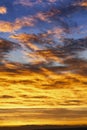 Gentle Sky at Sunset Sunrise with real sun and clouds. Real sunset sky. Royalty Free Stock Photo