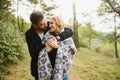 gentle and stylish couple are having a walk in the autumn park. Royalty Free Stock Photo