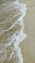 ?The Gentle Touch of Ocean Waves on Sand Royalty Free Stock Photo