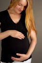 Gentle young pregnant blonde Royalty Free Stock Photo