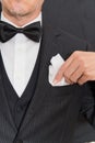 Gentleman In Black Tie Fixes Pocket Square, Vertical Royalty Free Stock Photo