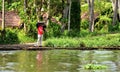 An gentleman fishing on the back waters