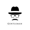 A gentleman with a hat, glasses and a mustache.