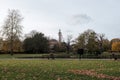 A gentleman sitting on a bench in regents park. A relaxing afternoon