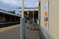 A gentleman walking towards the exit of southbury train station,Uk