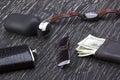 Gentlemanly set: sunglasses, perfume, wallet, flask, watch on wooden background Royalty Free Stock Photo