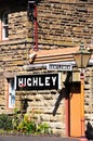 Gentlemen and Highley sign on station building.