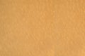 Genuine all natural beige tan leather grained texture swatch background, blank empty horizontal copy space macro closeup, large