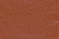 Genuine leather texture background. Dark orange,brown color leather skin natural with design lines pattern Royalty Free Stock Photo