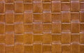 Genuine leather texture burnt orange color. Leather woven surface.