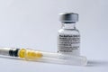 Genuine Pfizer BioNTech COVID-19 Vaccine bottle and syringe. Real vaccine photo.