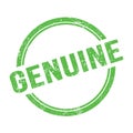 GENUINE text written on green grungy round stamp