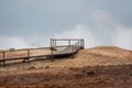 Geo Thermal hot spring activity in Iceland Gunnuhver Hot Springs wooden walkway