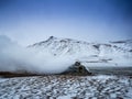 Geo-thermal vent releases mist and gas into the air in Iceland