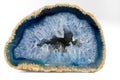 Geode with crystals of light-blue color. Cross section of natural stone Royalty Free Stock Photo