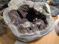 Geode filled with crystals of ferruginous dolomite and white calcite Royalty Free Stock Photo