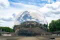 Geode, a mirrored spherical building reflecting the sky and surroundings in Parc de la Villette Royalty Free Stock Photo