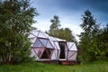 Geodesic dome in the forest, white house Royalty Free Stock Photo