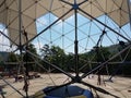 Geodesic dome with metal poles and triangles Royalty Free Stock Photo