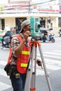 Geodesist making geodetic survey with Altometer Royalty Free Stock Photo