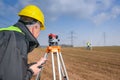 Geodesist measure land speak transmitter Royalty Free Stock Photo