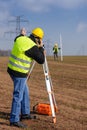 Geodesist measure land speak transmitter Royalty Free Stock Photo