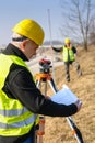 Geodesist read plans on construction site