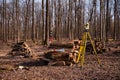 Geodesy, theodolite on a tripod in forest Royalty Free Stock Photo