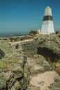 Geodetic pillar on rocky hilltop at the Castle of Monsanto