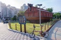 Brompton folding bike park in front of Korean traditional turtle warship Royalty Free Stock Photo