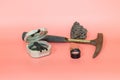 Geological fieldwork tools: hammer, compass, magnifying glass, rock samples, topographic and geological maps Royalty Free Stock Photo