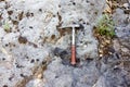 Geological hammer on the rock Royalty Free Stock Photo