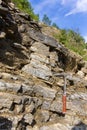 Geological hammer on the rocks Royalty Free Stock Photo