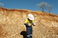 Geologist Hammering Rocks - Australia Royalty Free Stock Photo