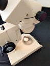 Geology microscope focused on illuminated rock Royalty Free Stock Photo