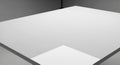 Geometric Abstract: Minimalist White Surface with Dramatic Shadow Play Royalty Free Stock Photo