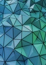 Geometric abstract pattern featuring an array of interconnected triangular facets. The Royalty Free Stock Photo