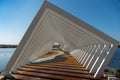 Geometric architectural shapes through through the center shapes at Manar mall in Ras al Khaimah, United Arab Emirates on a blue